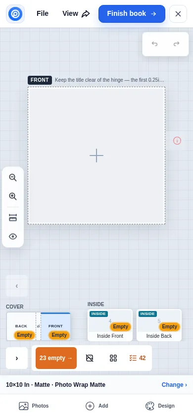 The Printcart Photobook designer open on a phone screen, with the Photos, Add and Design toolbar