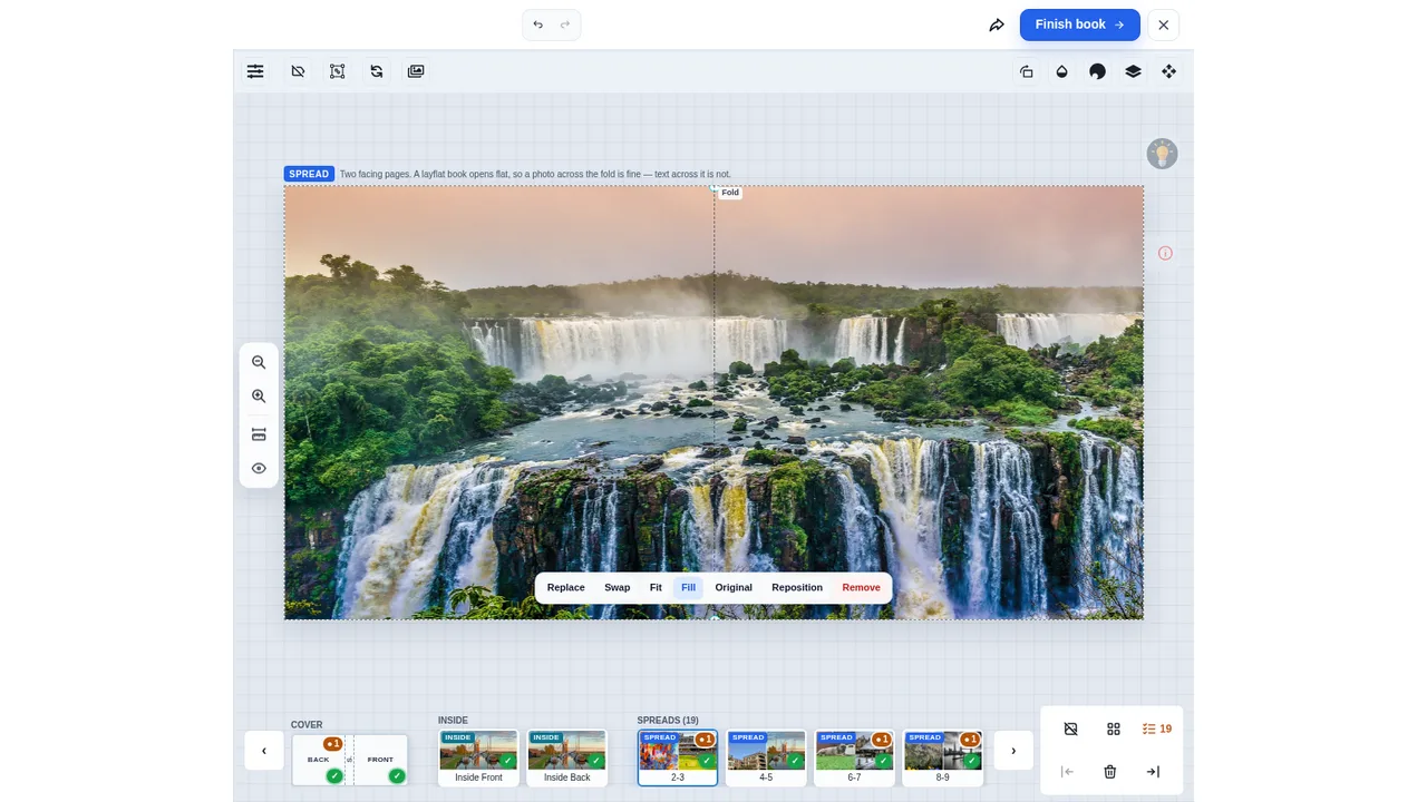 A panoramic photo laid across both pages of a spread in the Printcart Photobook designer