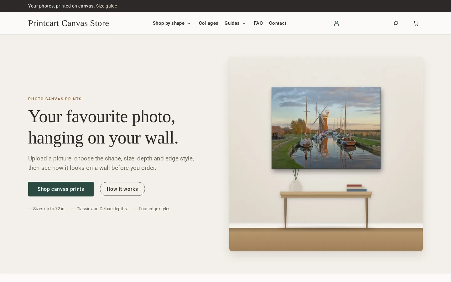 Home page of the Printcart canvas demo store: a photo canvas on a wall above a table