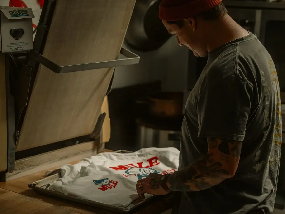 Stock photo: a custom T-shirt printed with a heat press, an order a print seller makes and ships